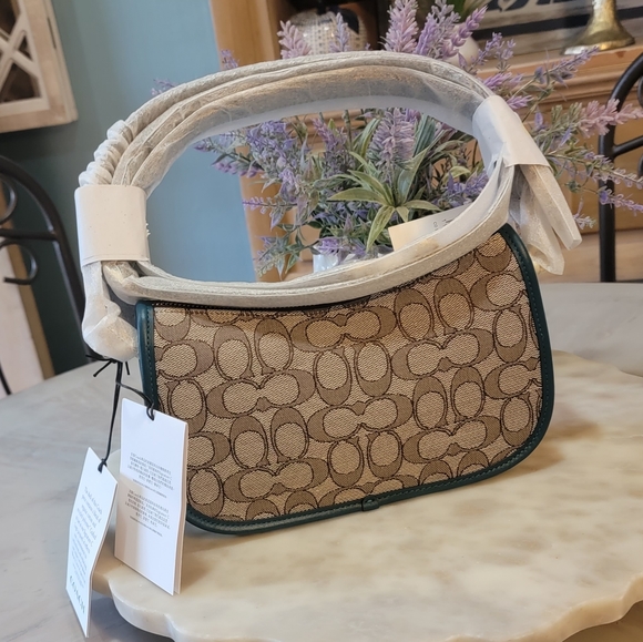 Coach Swinger in signature jacquard with teal color. - Picture 9 of 12